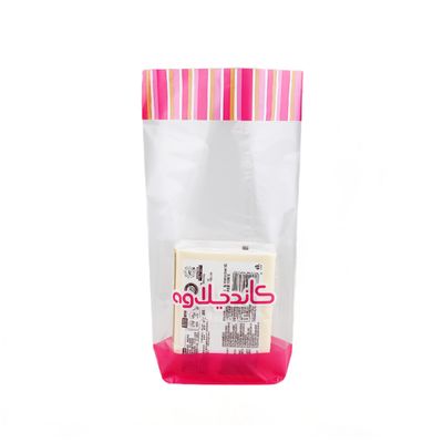 Voedselverpakking Stand-up pouch met kruisblok bodem en cellophane helder traktatie
