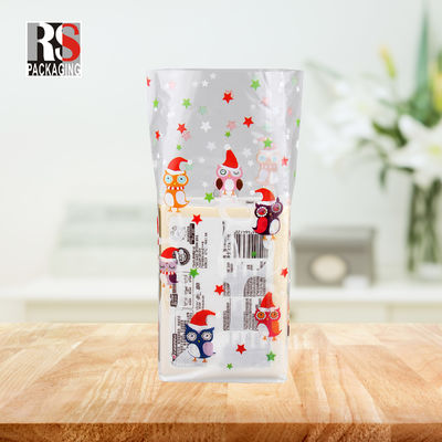 Voedselverpakking Stand-up pouch met kruisblok bodem en cellophane helder traktatie