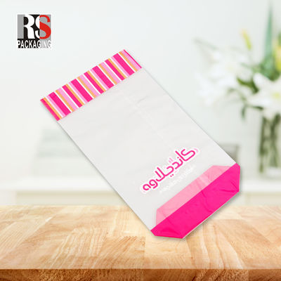 Voedselverpakking Stand-up pouch met kruisblok bodem en cellophane helder traktatie